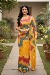 Woman in a colorful Bandhej Georgette Saree by Umaid Couture standing on a garden path with plants around.