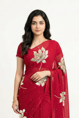 An Indian woman in Red Padma Saree embellished with Blooming lotus flowers made of Gota, Zari & sequins by craft of Aari-Zardosi, a product of Umaid Couture