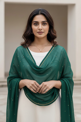 Woman wearing a green scarf with a neutral background. product by Umaid Couture
