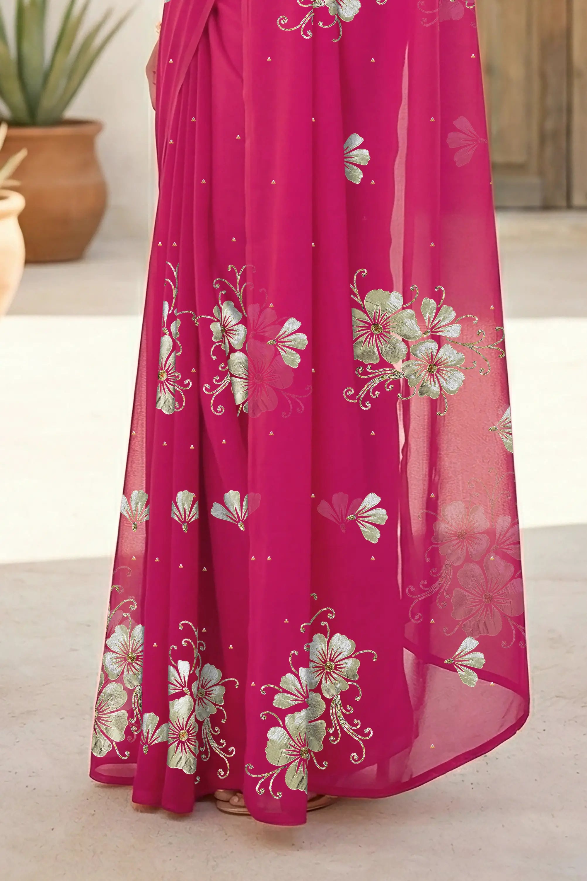 Model wearing a Pink Kusum Mulberry Silk  Chiffon saree embellished with Gota-Sequins Motifs by Umaid Couture