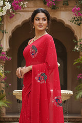 A model wearing a red peacock motifs saree by Umaid Couture standing in a Garden Courtyard.