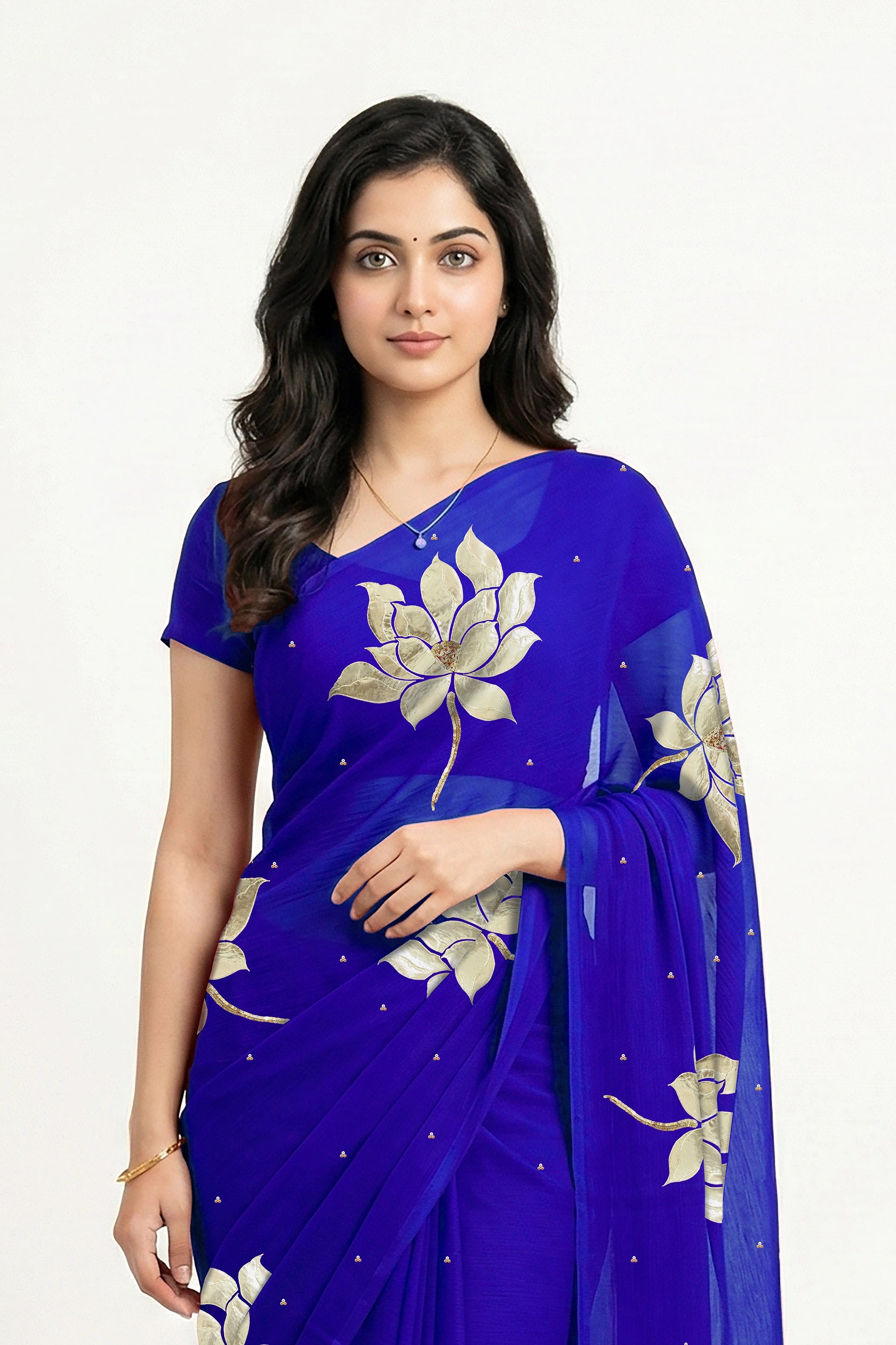 An Indian woman in blue Padma Saree embellished  with Blooming lotus flowers made of Gota, Zari & sequins by craft of Aari-Zardosi, a product of Umaid Couture