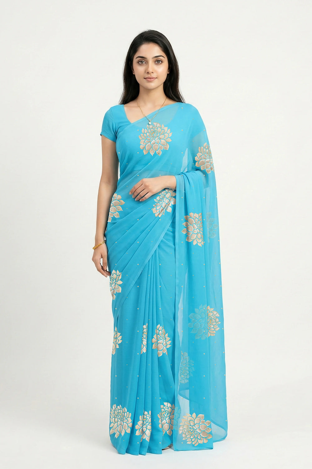 An Indian woman in Middle Blue Dahlia Saree embellished with Blooming Dahlia flowers made of Gota, Zari & sequins by craft of Aari-Zardosi, a product of Umaid Couture