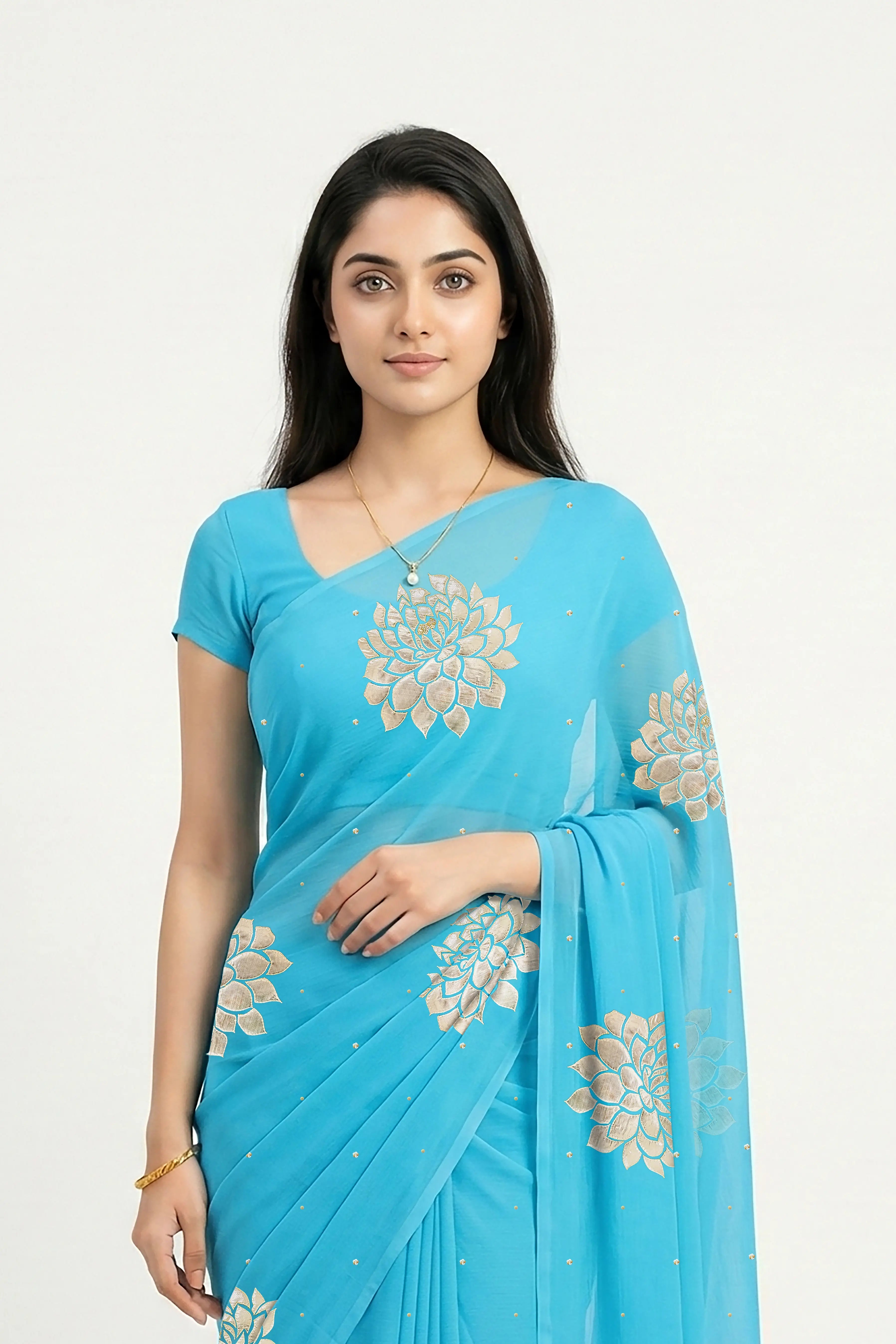 An Indian woman in Middle Blue Dahlia Saree embellished with Blooming Dahlia flowers made of Gota, Zari & sequins by craft of Aari-Zardosi, a product of Umaid Couture