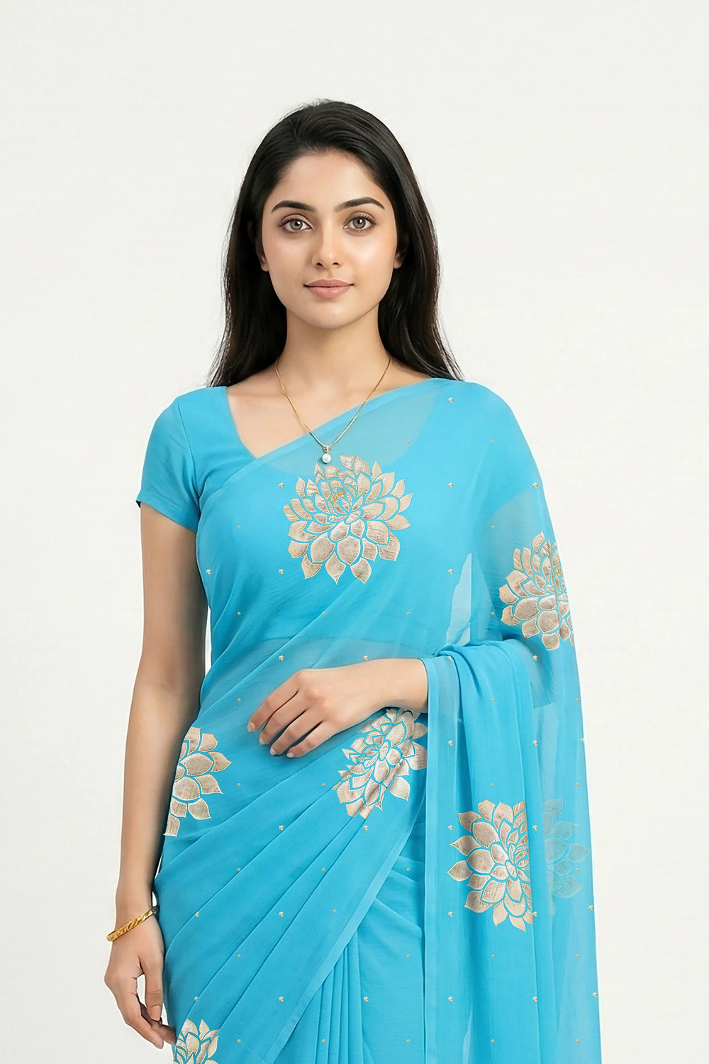 An Indian woman in Middle Blue Dahlia Saree embellished with Blooming Dahlia flowers made of Gota, Zari & sequins by craft of Aari-Zardosi, a product of Umaid Couture