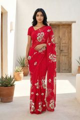 Model wearing a red Kusum Mulberry Silk  Chiffon saree embellished with Gota-Sequins Motifs by Umaid Couture