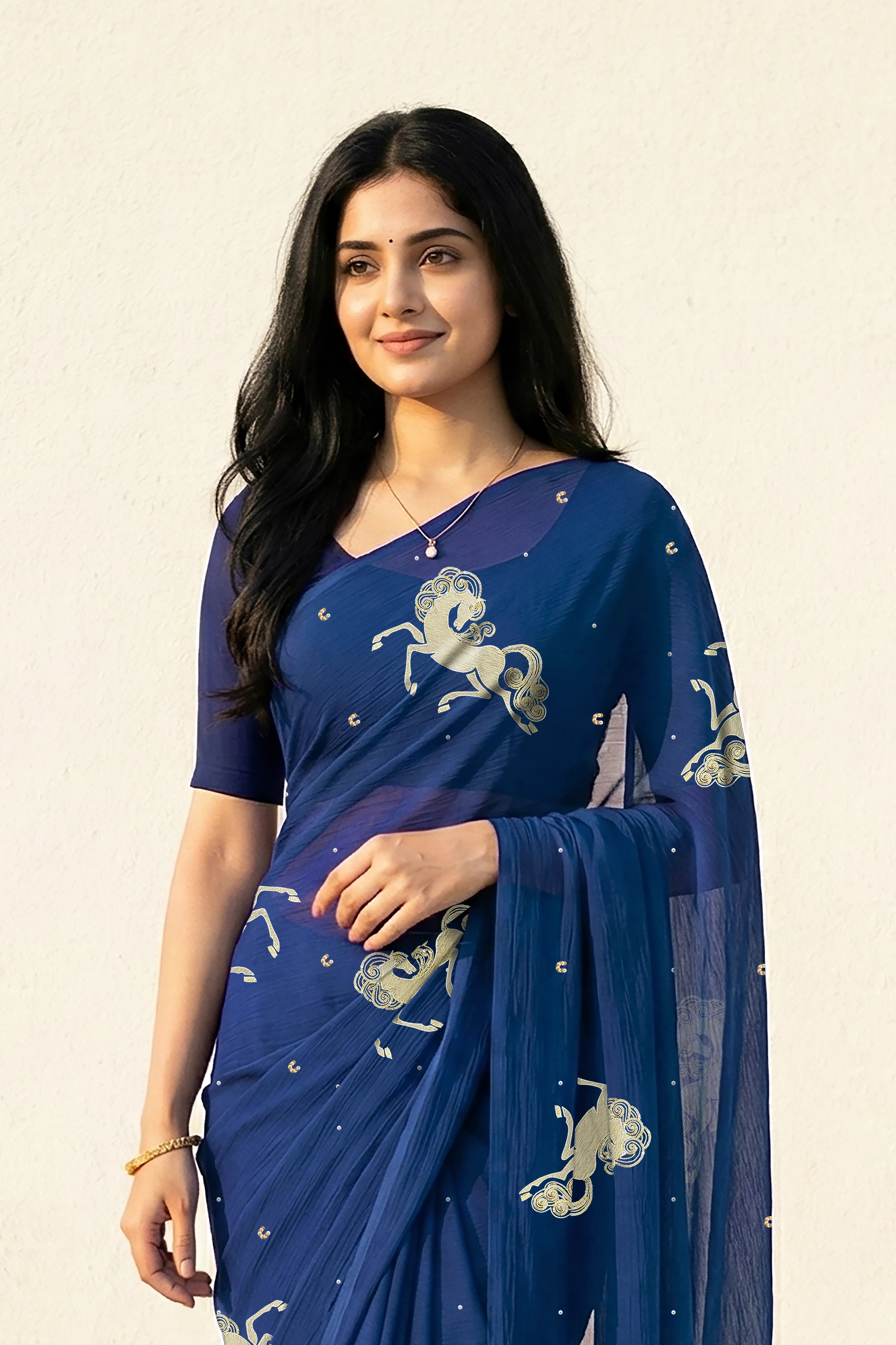 woman in Blue saree with silver golden sequins unicorn motif designs saree and finely work done with aari-zardosi  made by umaid couture.
