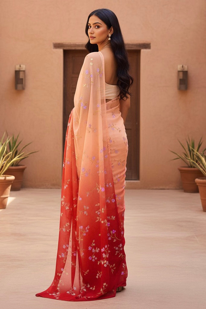 Woman wearing a saree with a gradient design in an outdoor setting. Product by Umaid Couture.