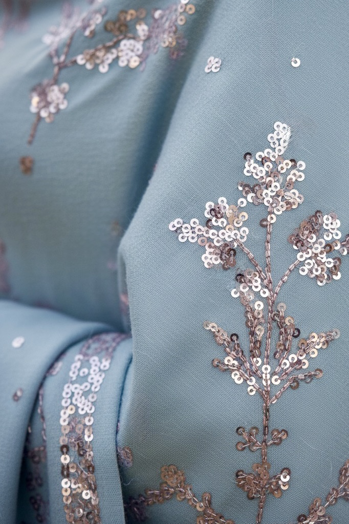 Close up of a light blue shawl by Umaid Couture