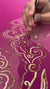  making video of crimson red saree with artistic cloud vines border on saree made by umaid couture.