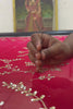 Making a vibrant red gulmohar glow saree by umaid couture, Aari-Taari Craftsman is doing sequins embroidery