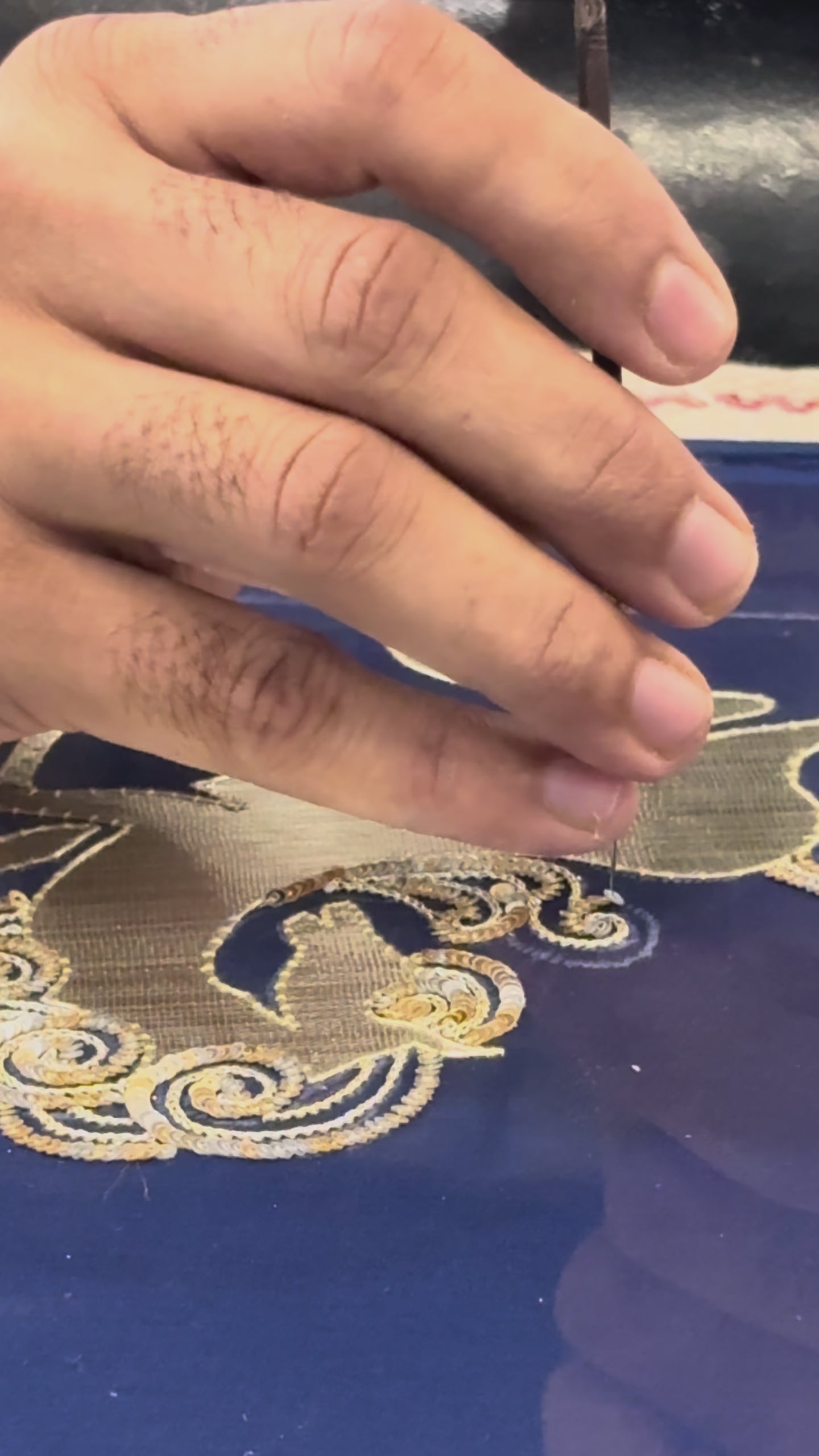 making video of Blue saree with silver golden sequins unicorn motif designs saree and finely work done with aari-zardosi  made by umaid couture.
