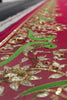 Video of Artisan making pretty parrot Aari-Zardosi handwork fuchsia saree by Umaid Couture