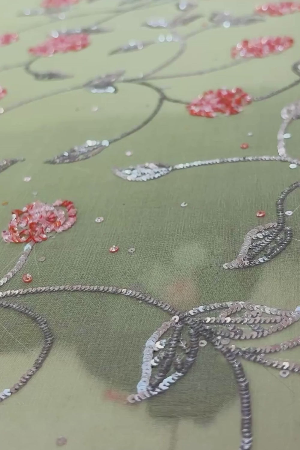 Video of Artisan making Blushing Roses Georgette Saree embellished with sequins rose vine by Umaid Couture